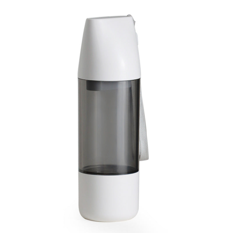 white portable dog water bottle and food container