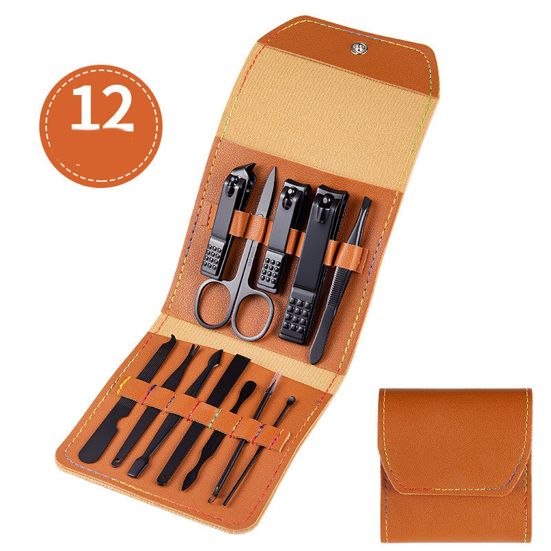 orange professional nail care set with scissors and clippers